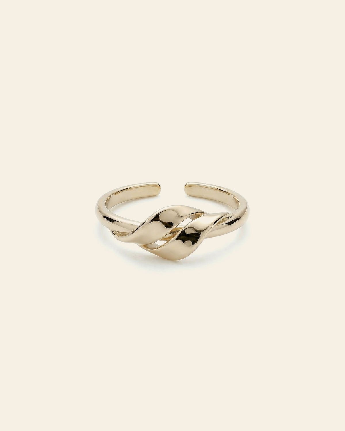 Domed gold ring with a single inset stone
